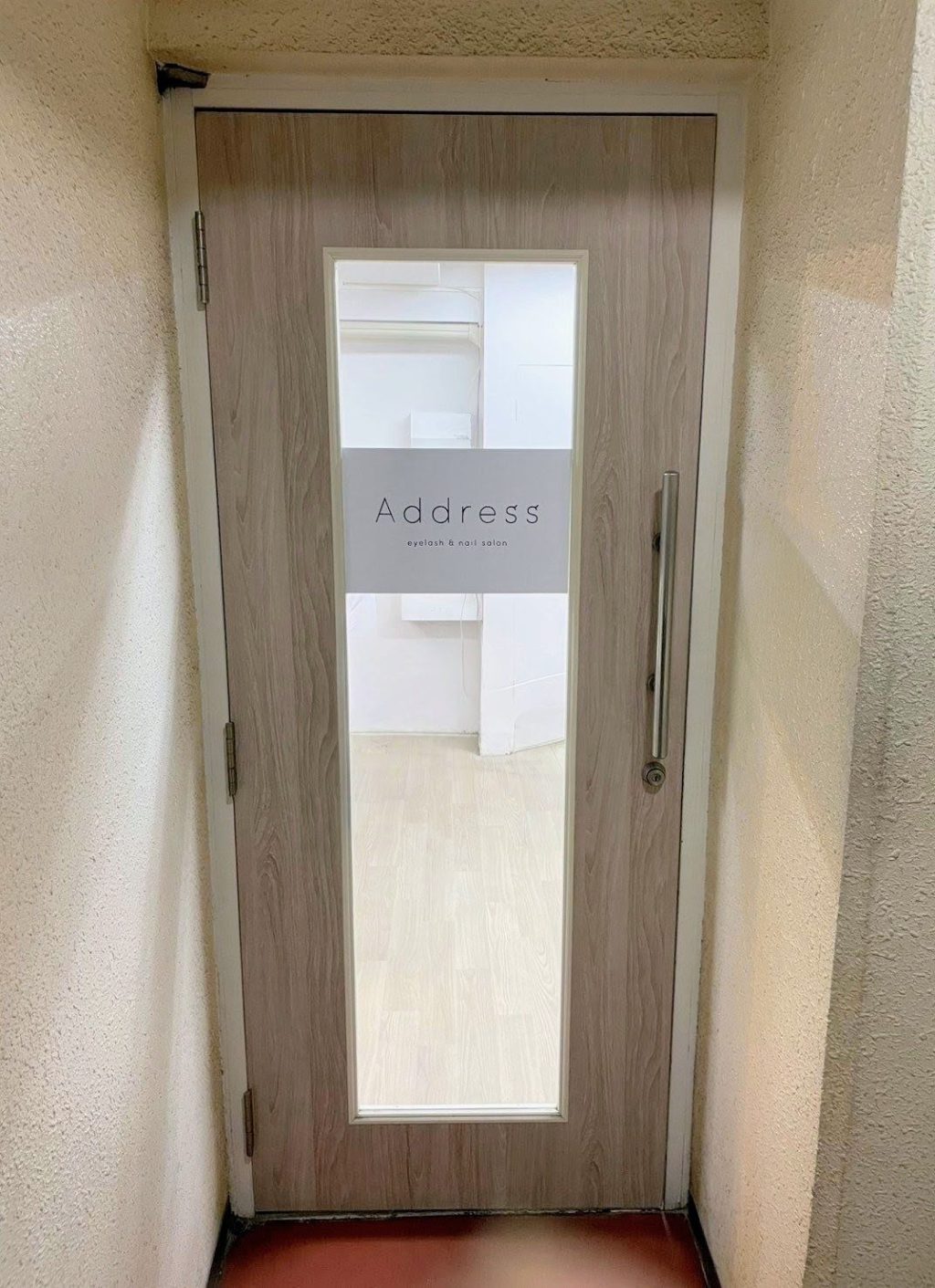 豊島区　店舗ドアのシート貼り替えアフター